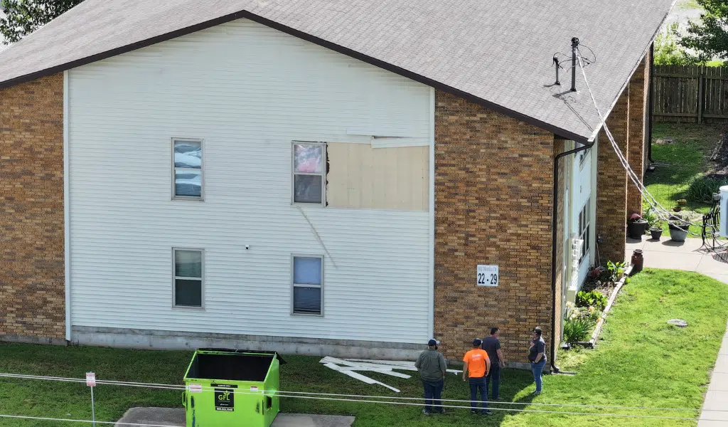 Siding Repair | Southwest Missouri | Teague Roofing Plus 1 Two story apartment building with siding work underway